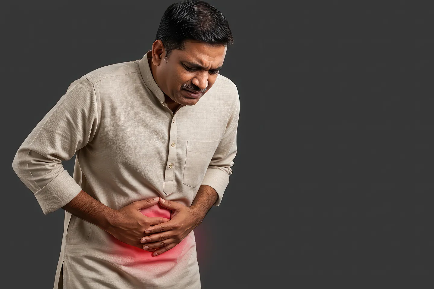 Person managing IBS with healthy diet and lifestyle habits.