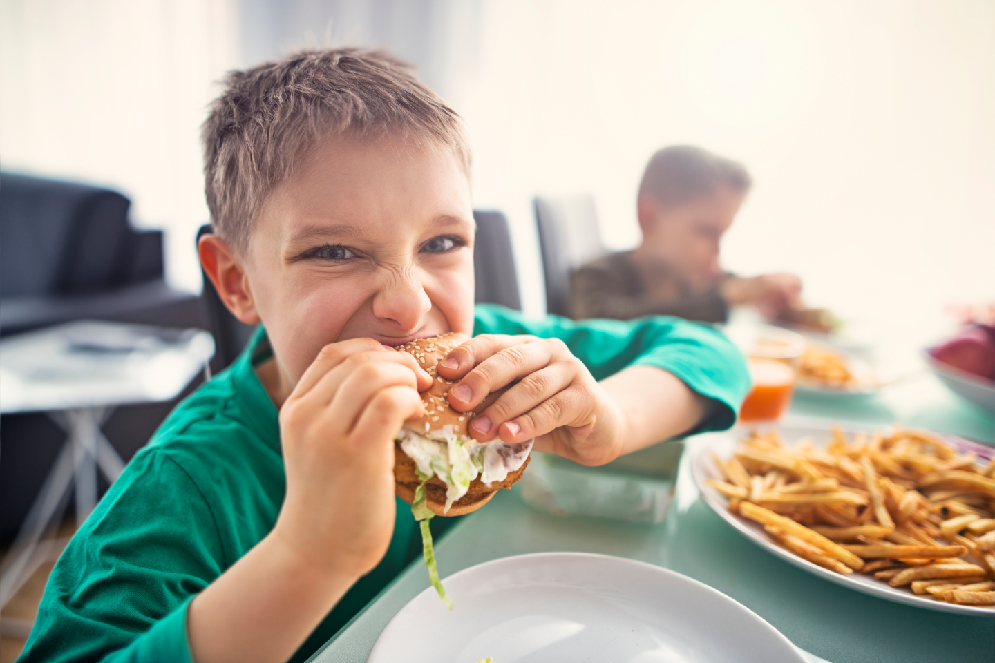 Tooth with a warning sign indicating hidden dental dangers in food