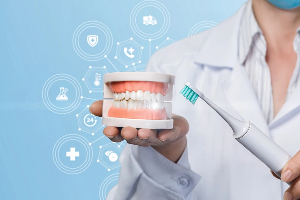 Dentist performing professional teeth cleaning on a smiling patient