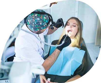 Dentist examining a patient during a routine dental checkup
