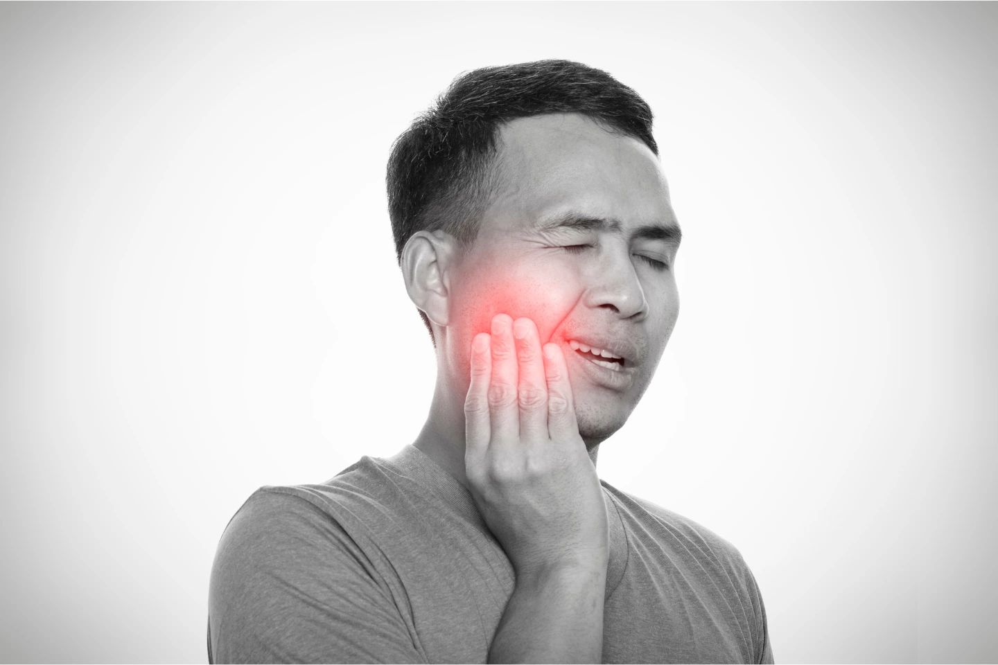 person with jaw pain highlighting dental discomfort