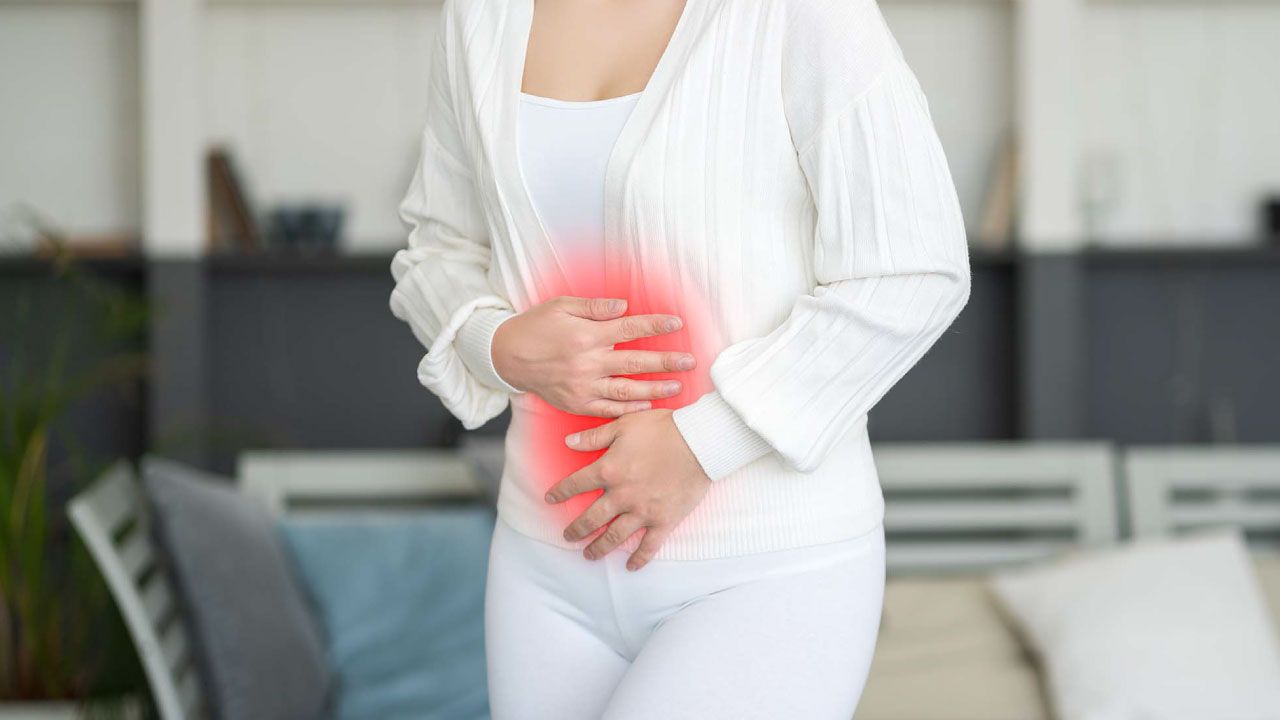Couple holding hands with a supportive gesture in a calm setting