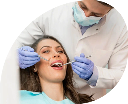 Dentist examining a patient during a routine dental checkup