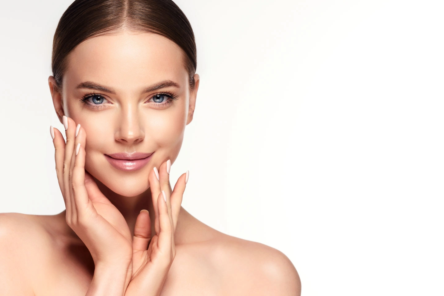 Glowing skin model representing year-round skincare at Lily Aesthetics aesthetic clinic in Parker CO