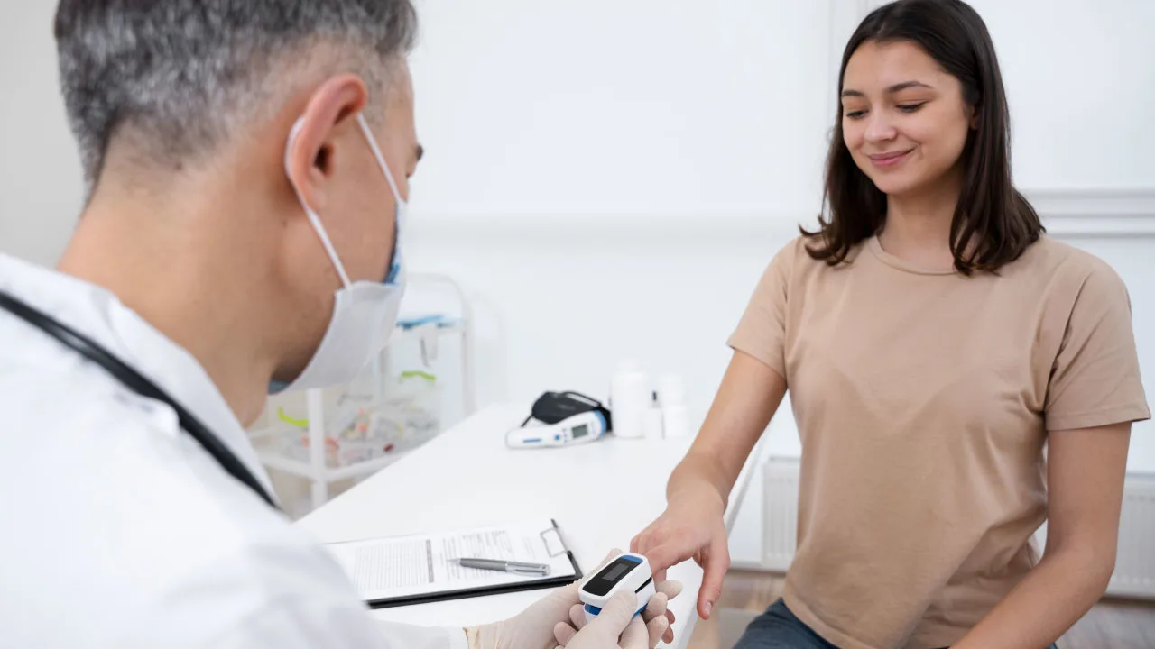 Dentist discussing dental implant treatment with a patient who has diabetes