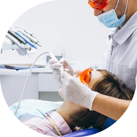 Dentist examining a patient during a routine dental checkup