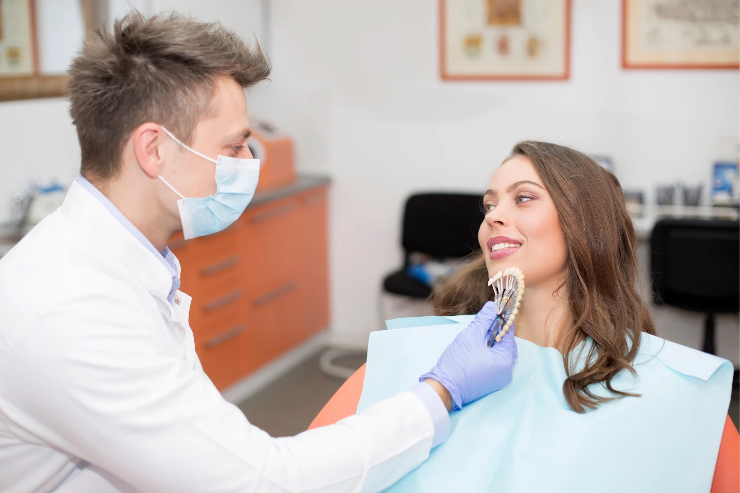 Charlotte Perio periodontal specialist evaluating patient for gum disease treatment, gum recession care, and cosmetic planning.