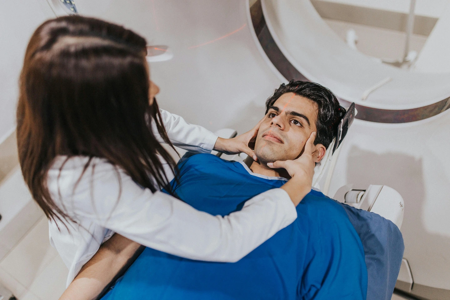 Patient undergoing MRI scan with dental implants, showing MRI safety and titanium implant evaluation