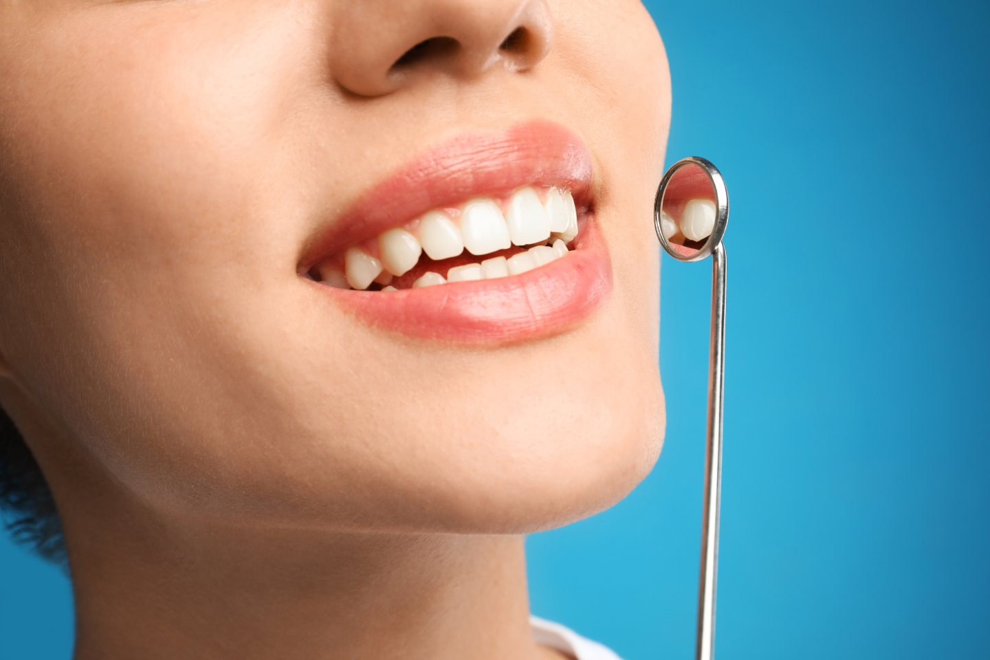 Tooth icon with a clock and heart symbolizing dental health after 50