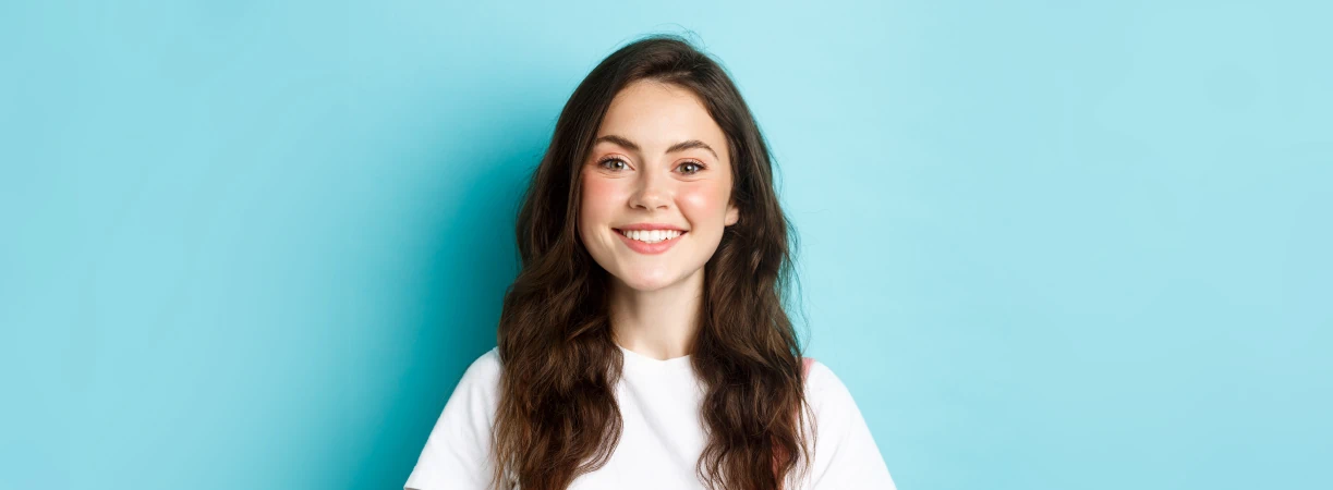 Patient smiling after a successful smile transformation